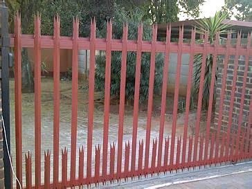 high metal gates and fences of houses in africa|palisade fencing south africa.